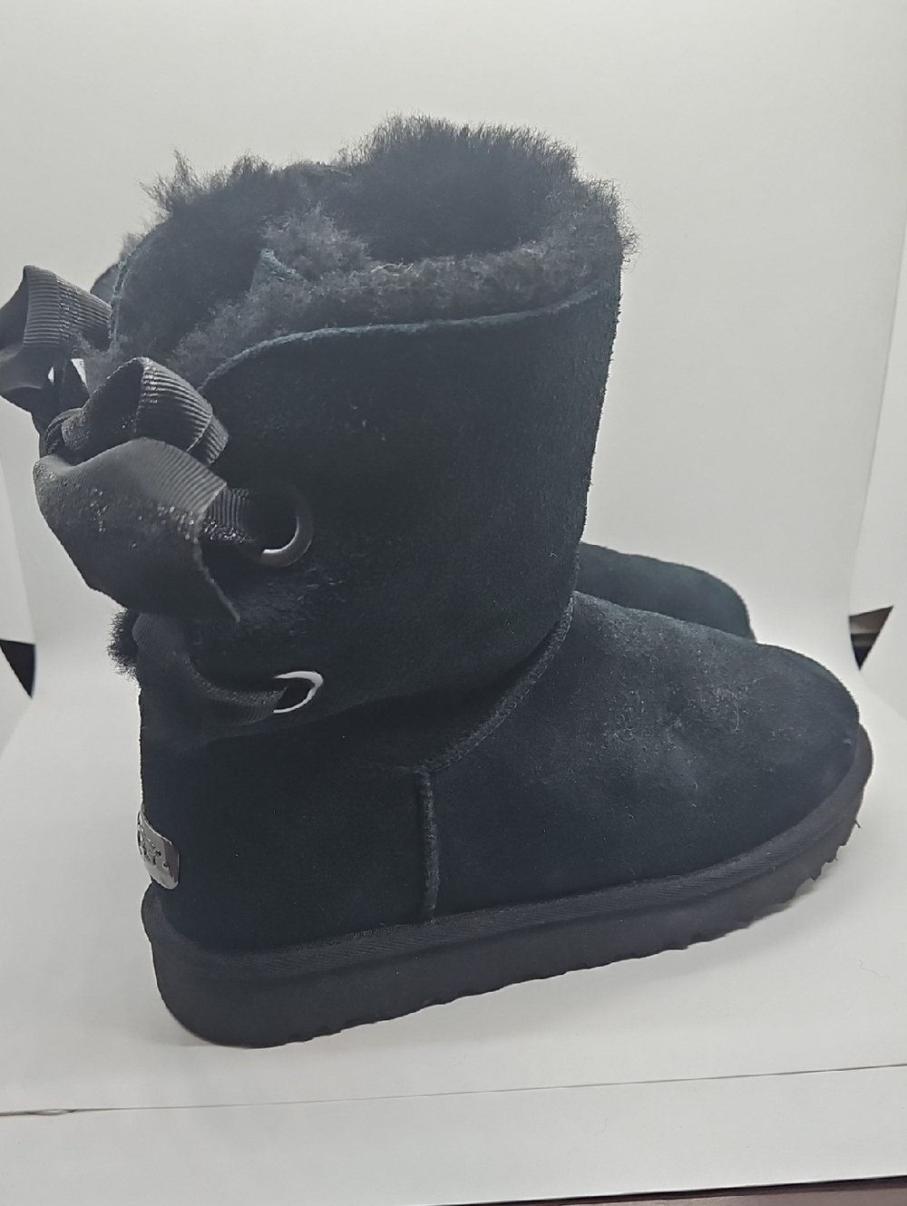 NWOT UGG Black Suede Short Fur-Lined Boots with Back Bow Detail